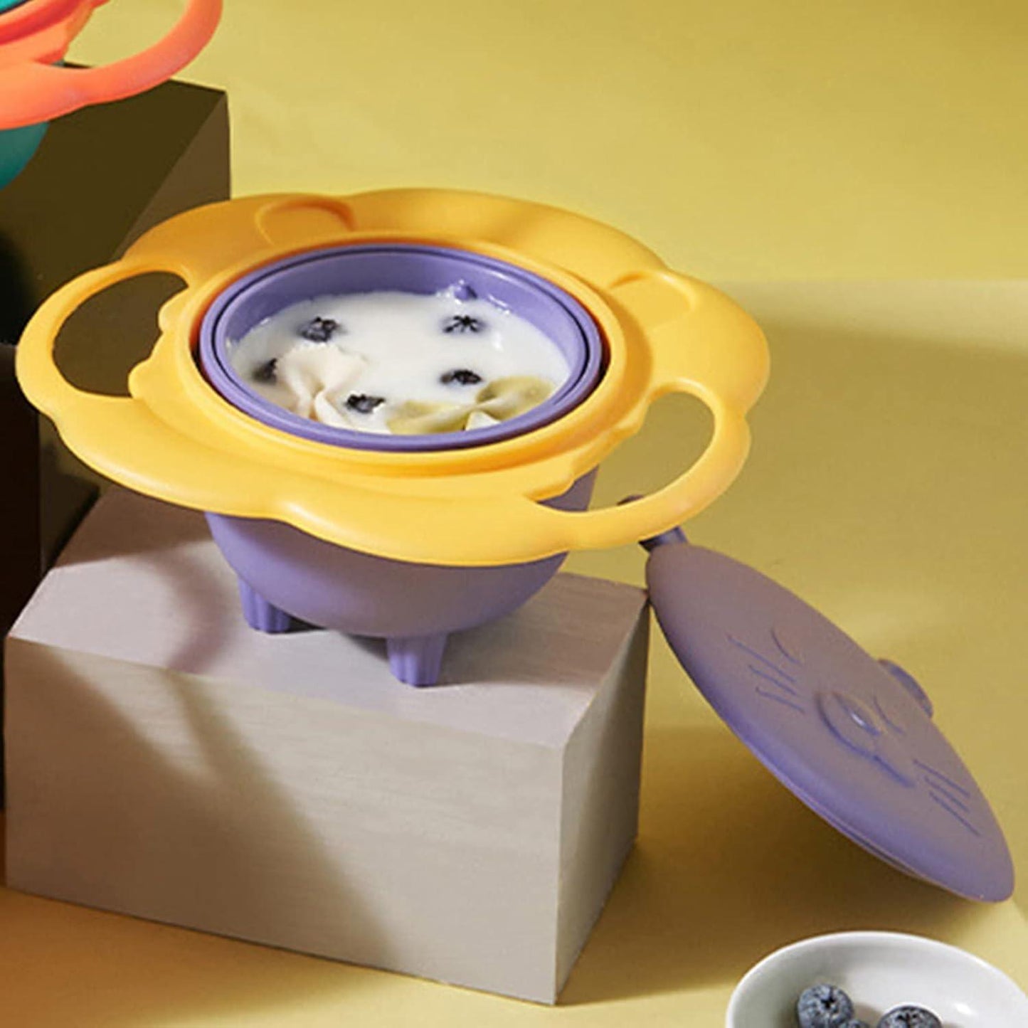 Anti-spill baby feeding bowl with easy-grip handles